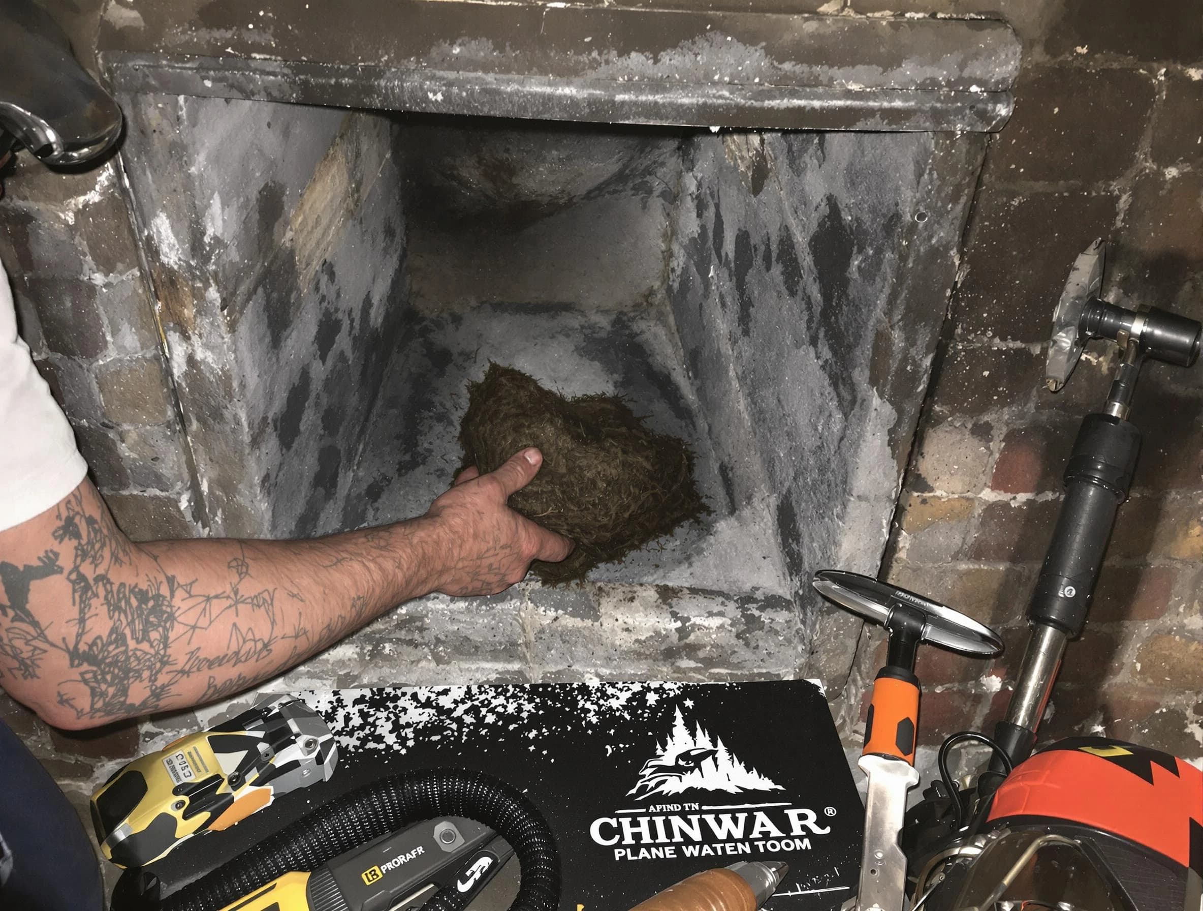 Ambridge Chimney Sweep safely removing debris and screening chimney in Ambridge, PA